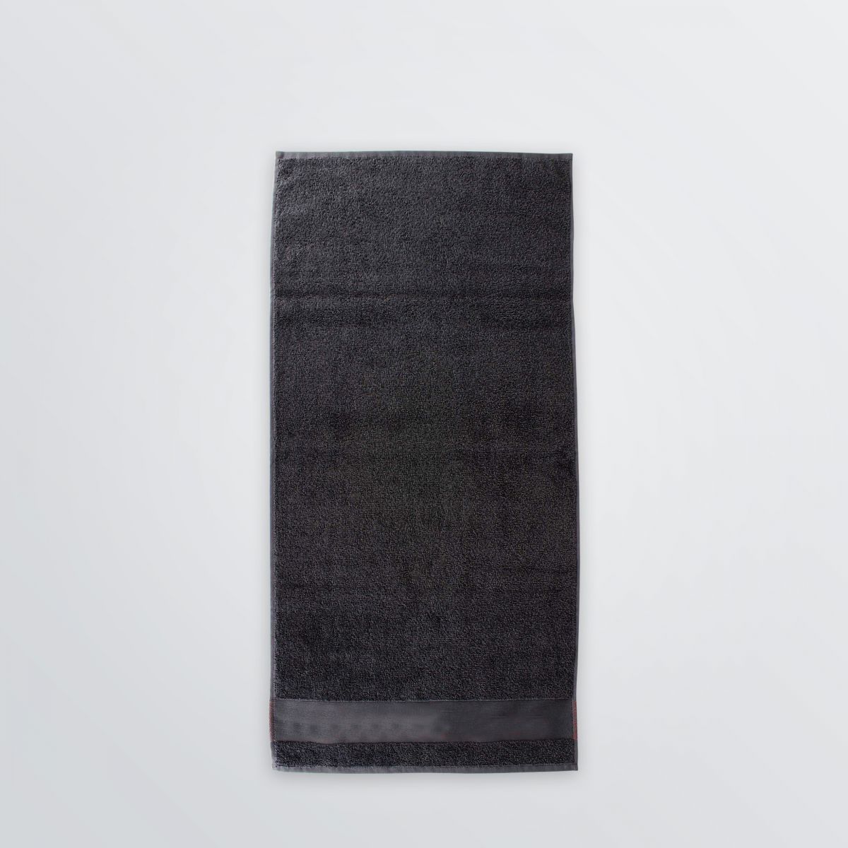 Ausgerolltes großes Baumwoll-Handtuch individualisierbar - Farbbeispiel dunkelgrau